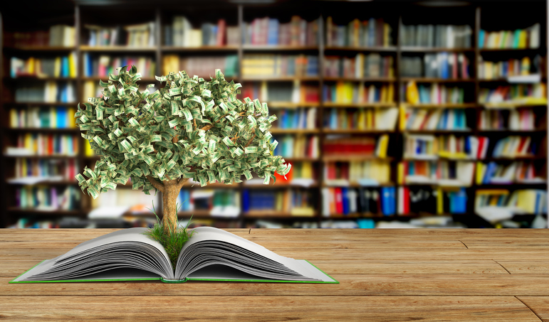 tree growing from book