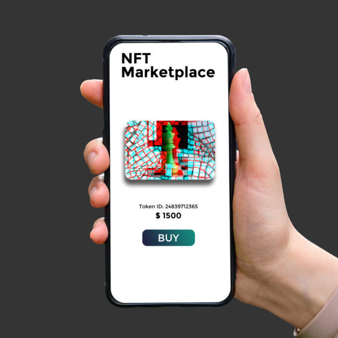 Hand holds smartphone with type of cryptographic NFT marketplace with art sale