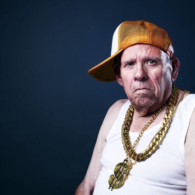 Grandfather with a cap and golden chains