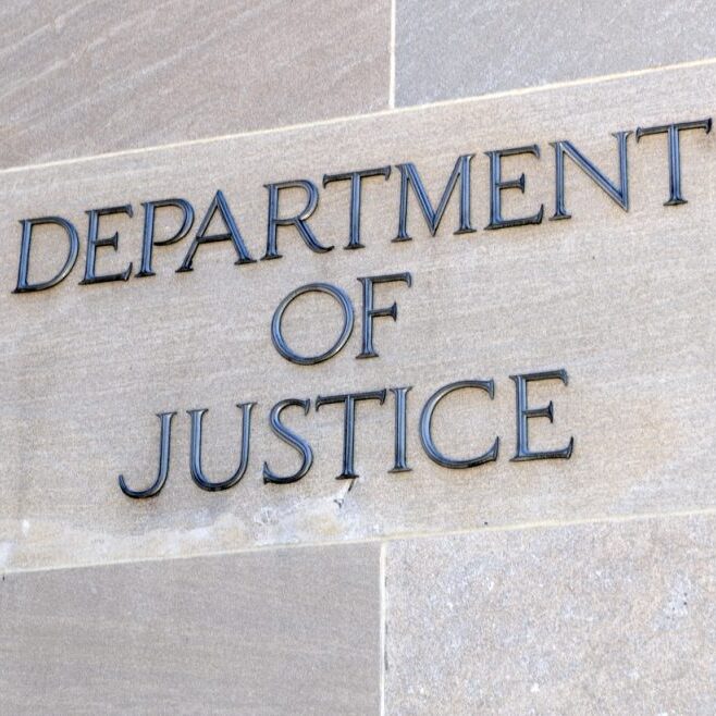 Department of Justice sign, Washington DC, USA. Many law enforcement agencies are administered by the DOJ, including the FBI, DEA and Federal Bureau of Prisons